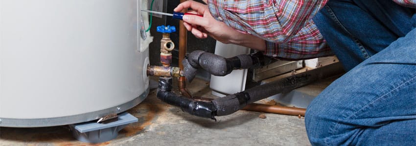Repairing a flooded hot water systems in Brisbane.